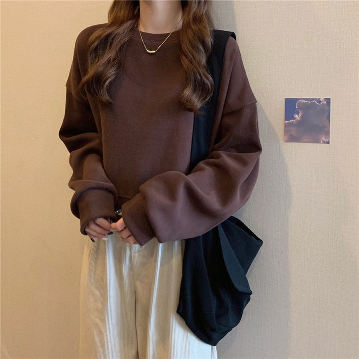Kvinders afslappede oversized sweatshirt med komfortkrave og bløde manchetter