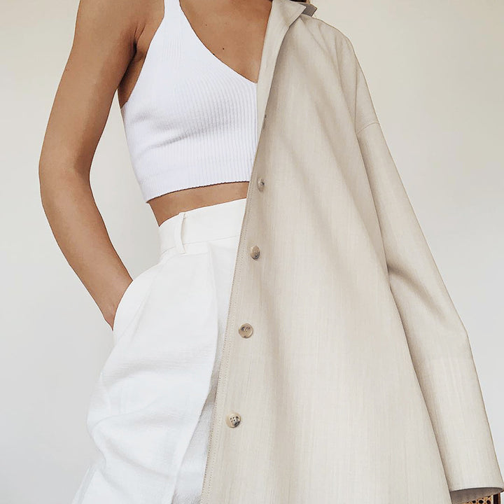 Dame Oversized Trenchcoat med moderne detaljer og knaplukninger ved ærmerne Stilla