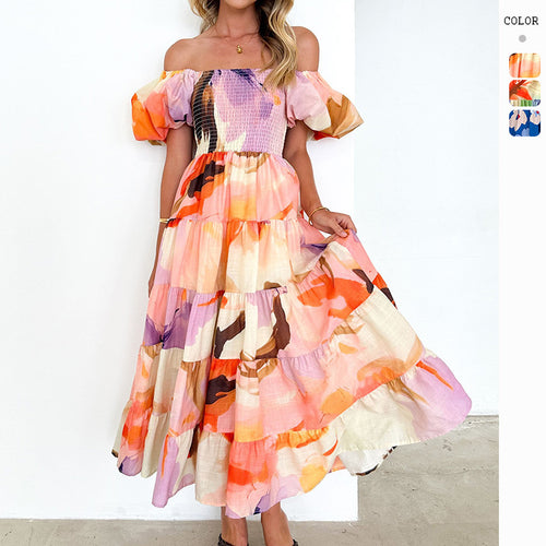 Kvinders maxikjole med off-the-shoulder design og voluminøse puffærmer Stilla