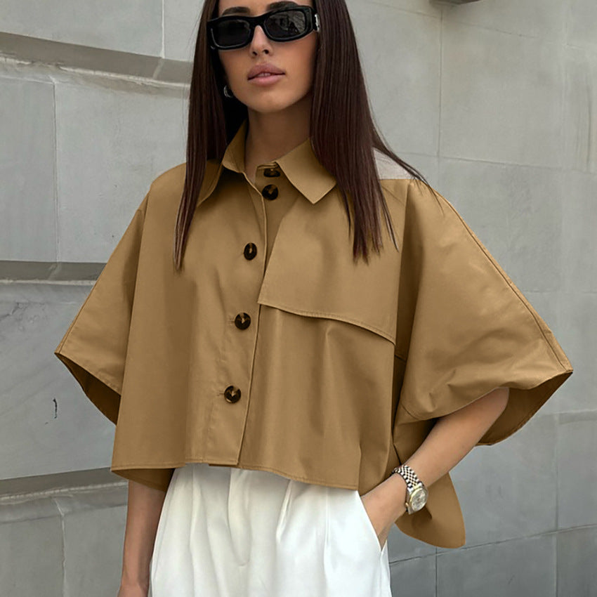 Dame elegant Oversized Bluse med asymmetrisk design og praktiske knapdetaljer Stilla