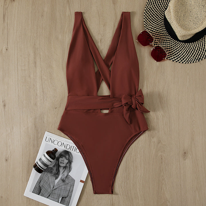 Dame sporty one-piece swimsuit with cross-back and tie belt Skovae