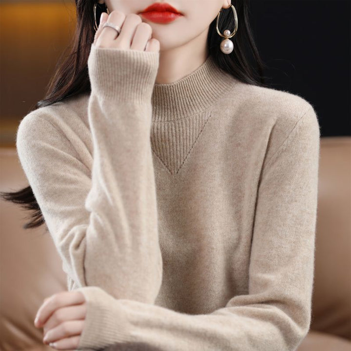 Damernes fine sweater med høj krave og elegante detaljer Stilla