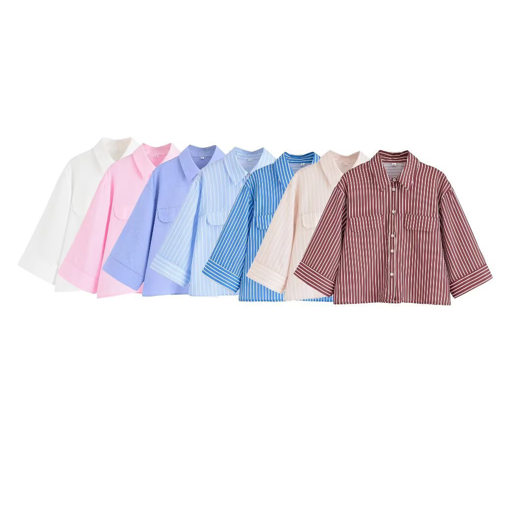 Dame stribet bluse med oversized pasform og praktiske lommer Stilla