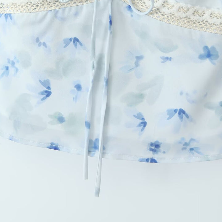 Dame spaghetti strop top med blomsterlige accenter og romantisk snit Stilla