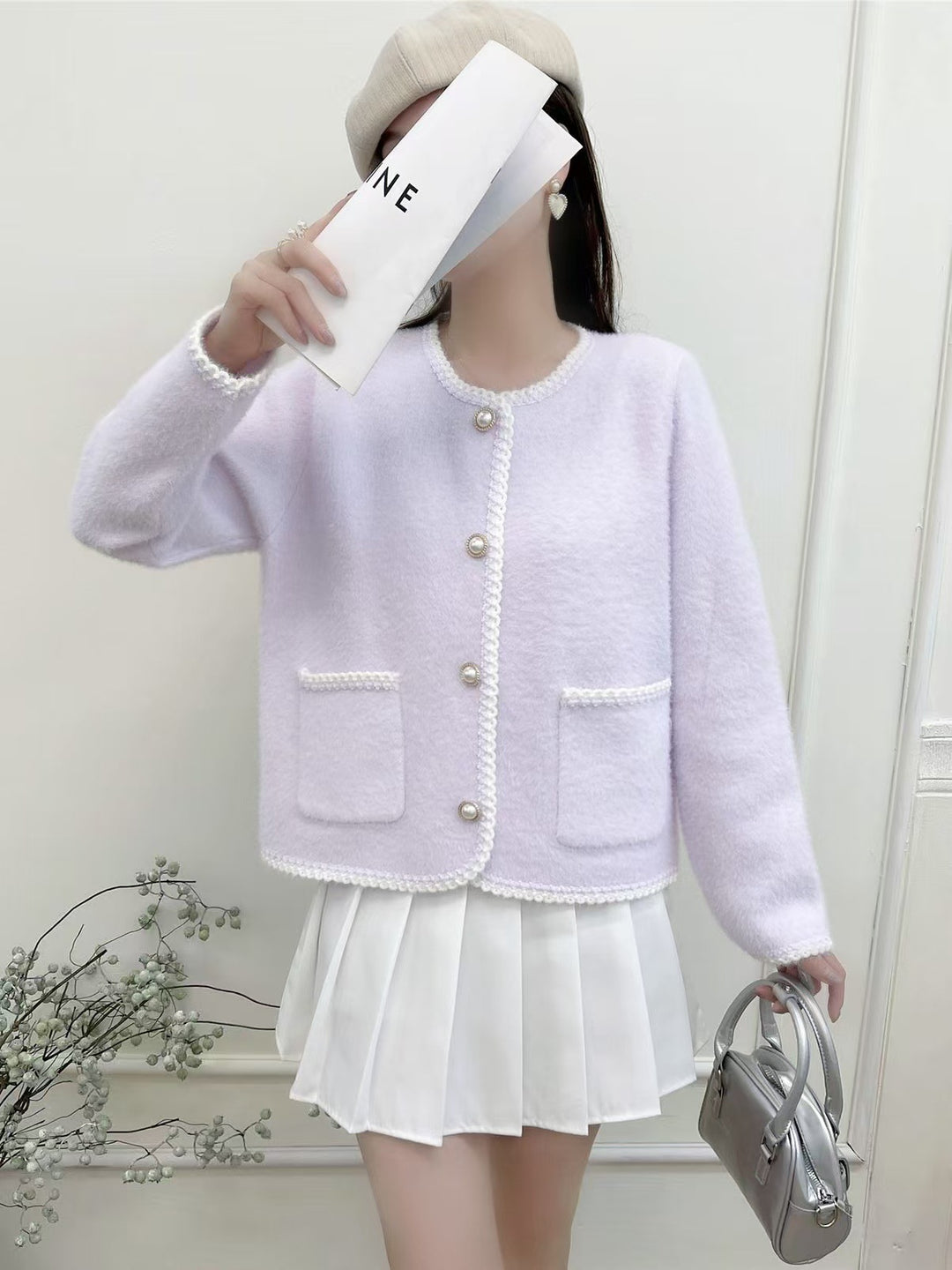 Kvinders elegante cardigan med dekorativ knapstolpe og lommer