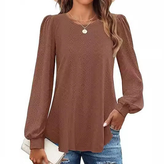 Damebluse med puffærmer og hulmønster Stilla