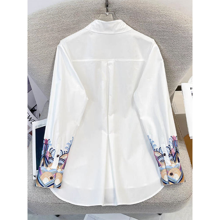 Dame eksklusiv langærmet bluse med kunstnerisk broderedesign og moderne accenter Stilla