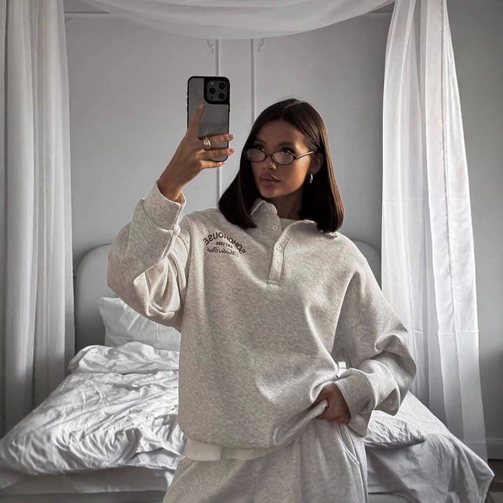 Kvinders afslappede polo sweater med en afslappet pasform og kontrastdetaljer Stilla