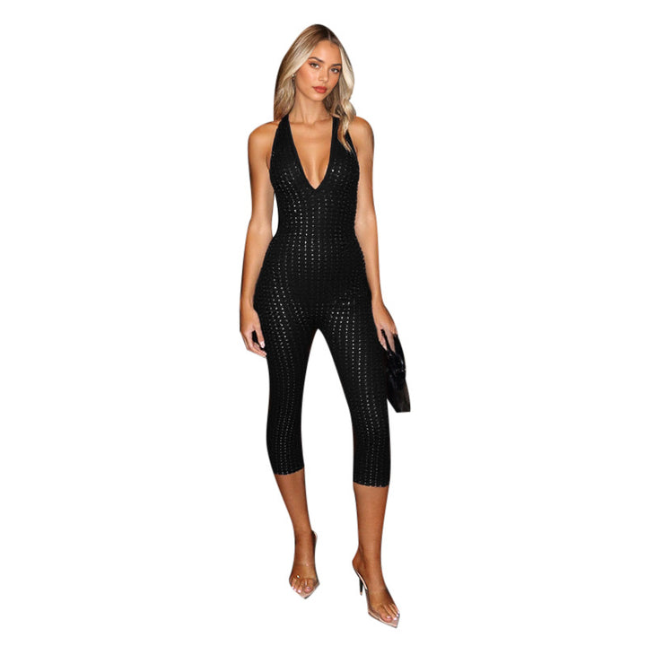 Dame figursyet jumpsuit med dybt V-udskæring og netlignende design Skovae