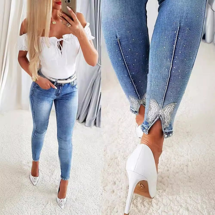 Dame Skinny Jeans med moderigtigt distressed effekt og høj talje Stilla