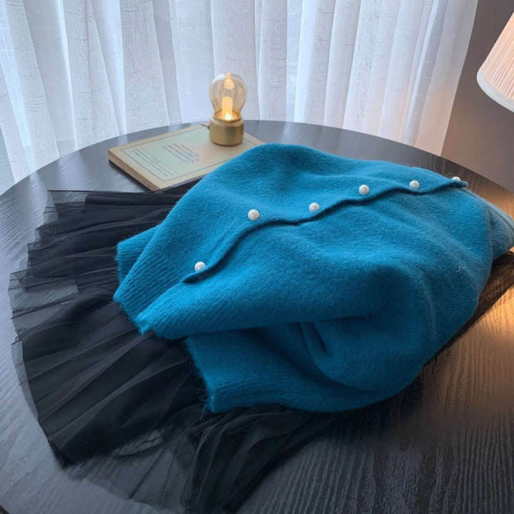 Kvinders cardigan med elegante perleknapper og moderne design Stilla