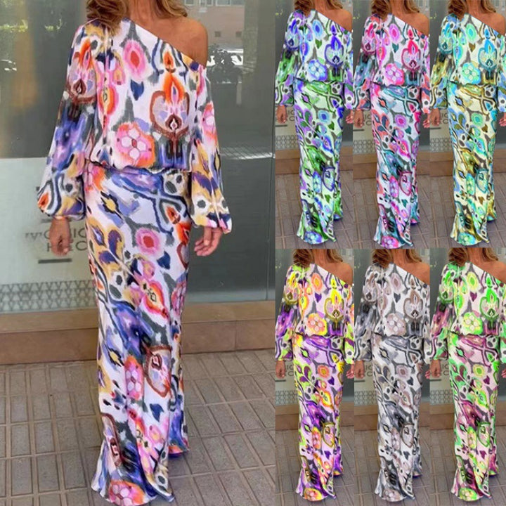 Dame maxikjole med asymmetrisk snit og blomsterprint Stilla