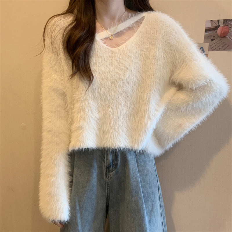 Kvinders fluffy sweater med afslappet skær og dyb V-hals Stilla