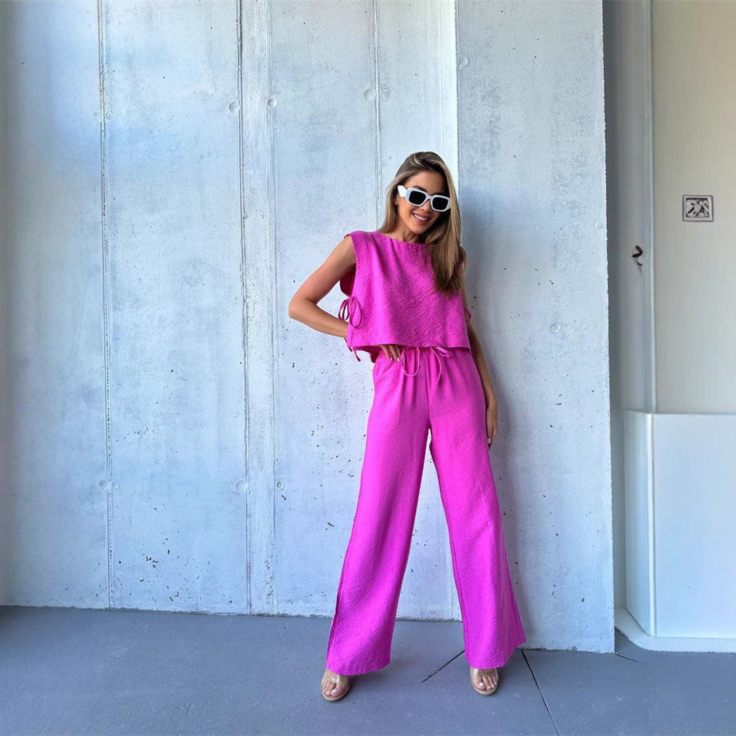 Kvinders bredbenede jumpsuit med lagdelt top og snøre Skovae