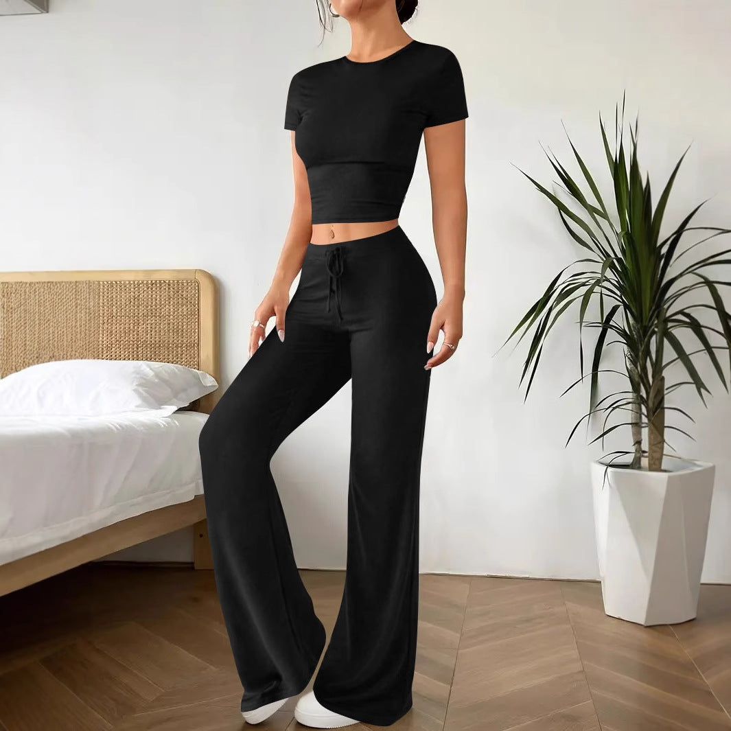 Dame Lækkert koordinatsæt med cropped top og løstsiddende bukser Stilla