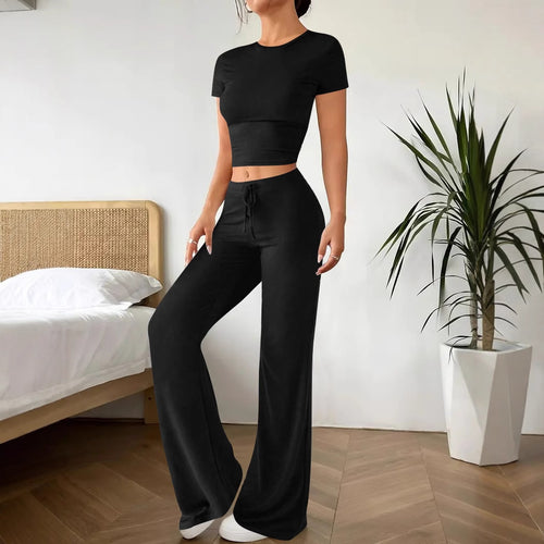 Dame Lækkert koordinatsæt med cropped top og løstsiddende bukser Stilla