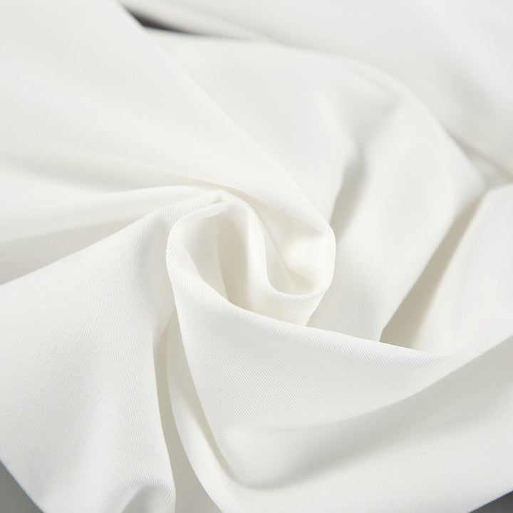 Damebluse med asymmetrisk udskæring og voluminøse ærmer Stilla