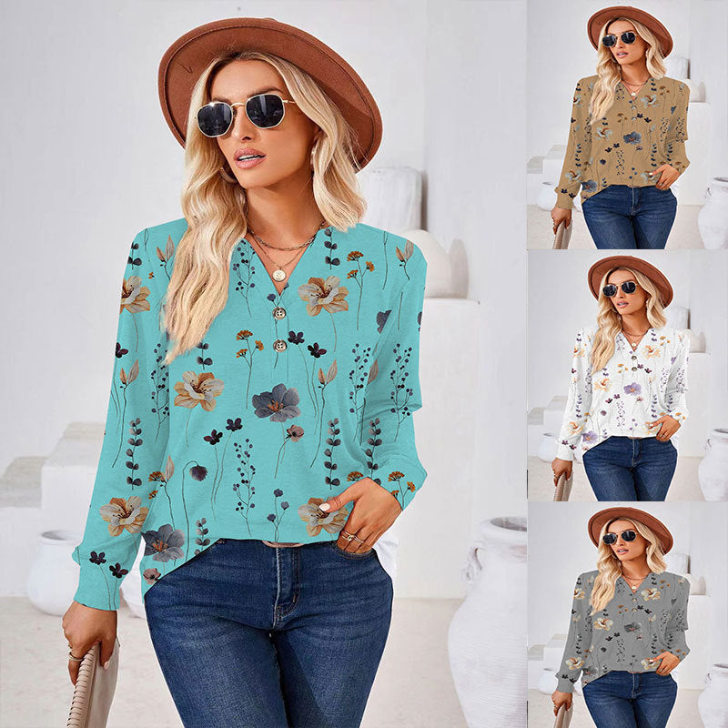 Damebluse med blomsterprint og knapdetaljer Stilla