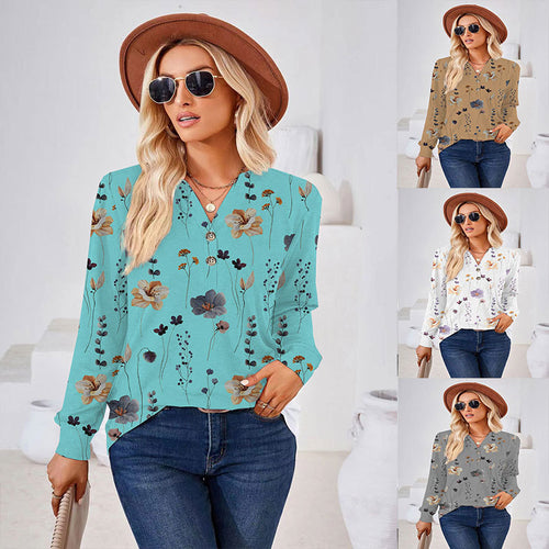 Damebluse med blomsterprint og knapdetaljer Stilla