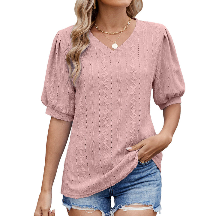 Damebluse med elegante puffærmer og fint hulmønster Skovae