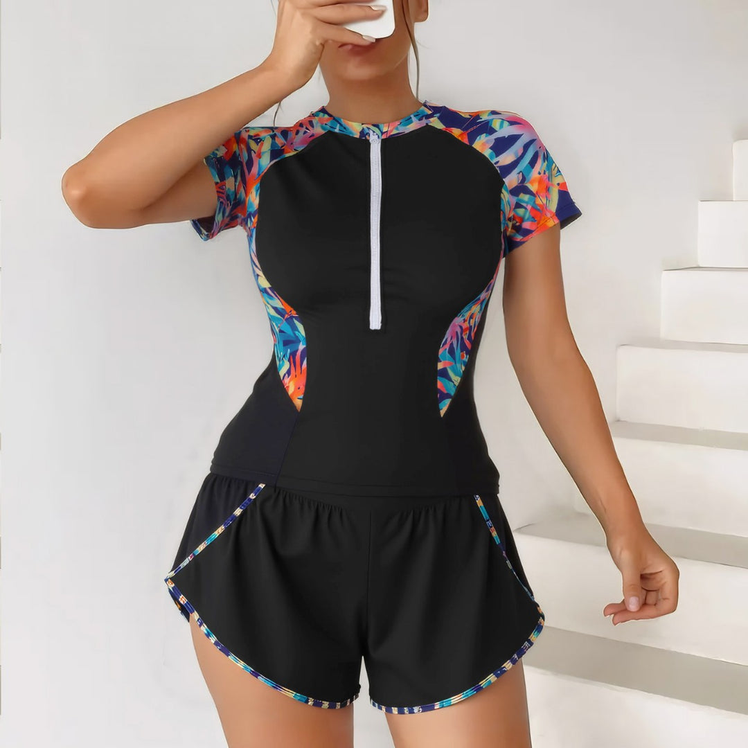 Dame Sporty svømmedragt med innovativ lynlås og stilfulde korte shorts Skovae