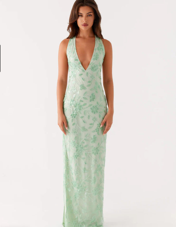 Dame elegante kjoler med lange ærmer og blomsterløs applikation samt dyb v-hals.