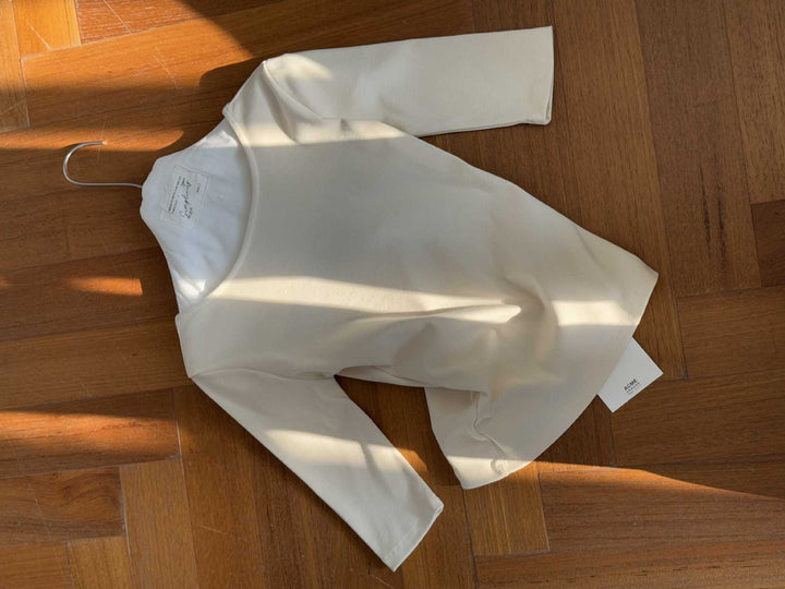 Dame elegant Langærmet top med dyb rygudskæring og blødt bærekomfort Stilla