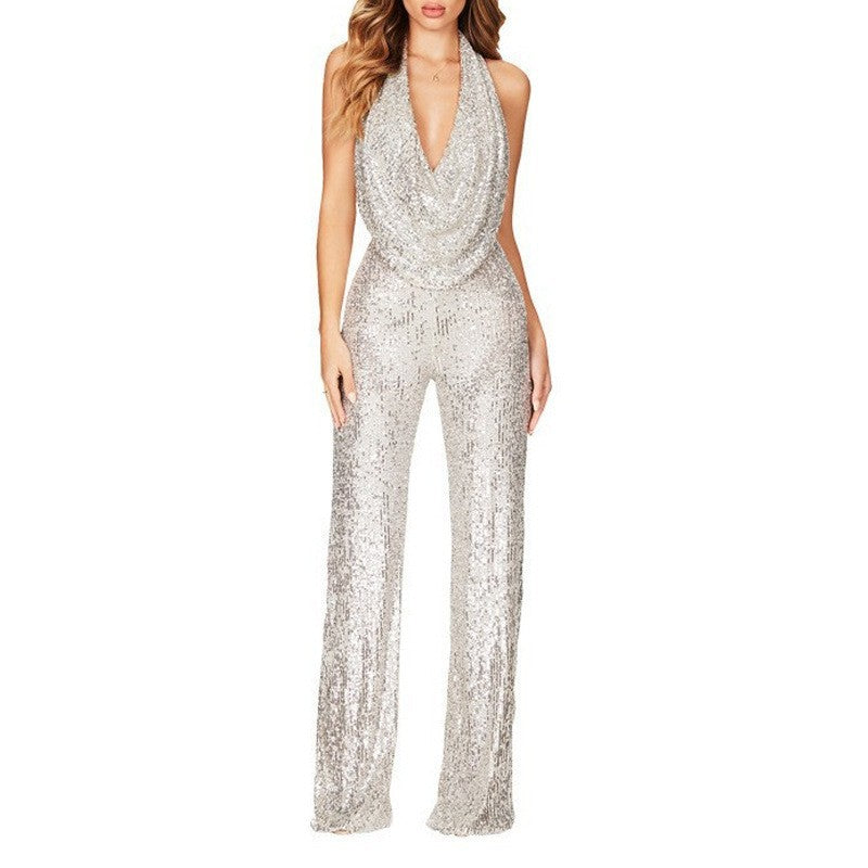 Dame glamourøs jumpsuit med glitrende pailletter og dyb udskæring Stilla
