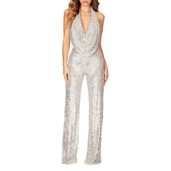 Dame glamourøs jumpsuit med glitrende pailletter og dyb udskæring Stilla