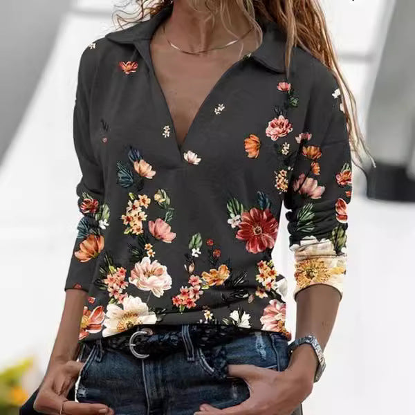 Damebluse med blomsterdesign og polo-krave Stilla