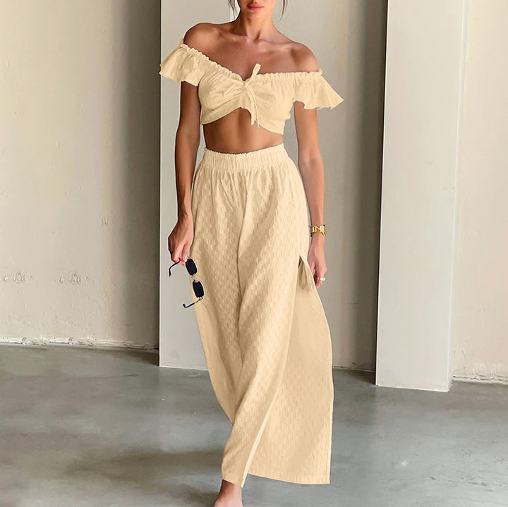 Dame sæt bestående af skulderfri crop-top og højt skåret maxiskørt Stilla