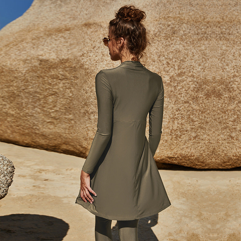 Dame sporty badedragt med lange ærmer og ikonisk design Stilla