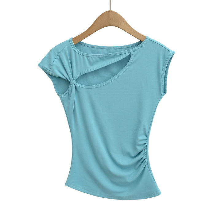 Dame sportslig top med asymmetrisk snit og modige cut-out-detaljer Stilla