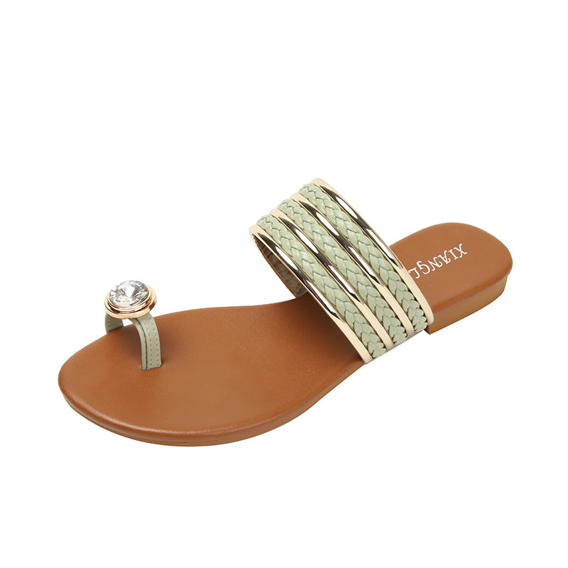 Dame flip-flops med flettede remme og funklende accent Stilla
