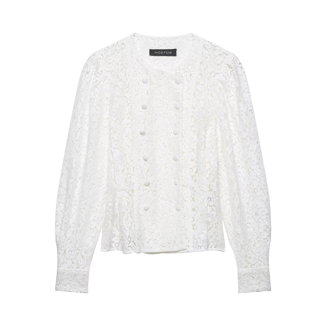 Dame spidsbluse med dekorative knapper og elegant pasform Skovae
