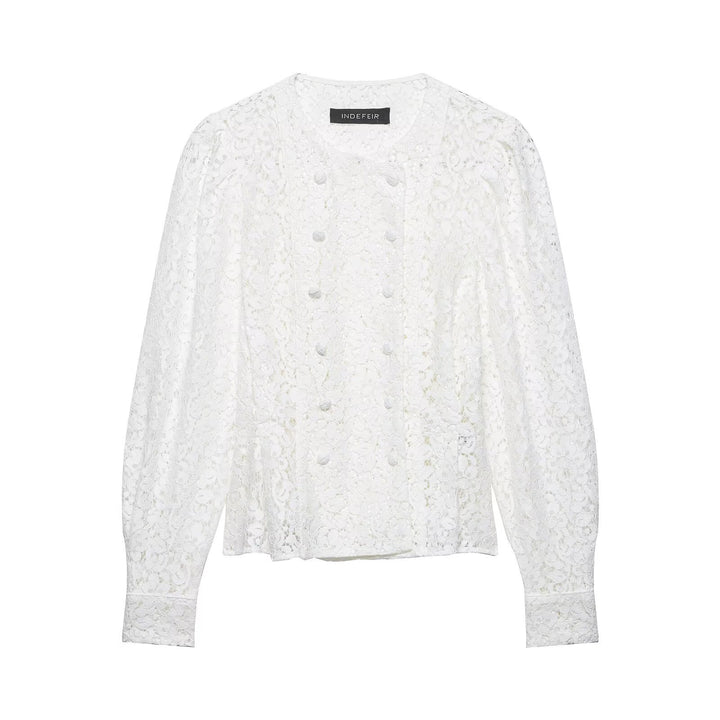 Dame spidsbluse med dekorative knapper og elegant pasform Skovae