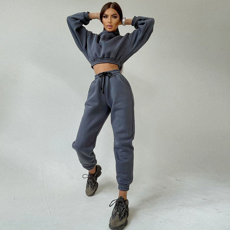 Kvinders sporty cropped sweat sæt med elastisk talje og praktiske lommer