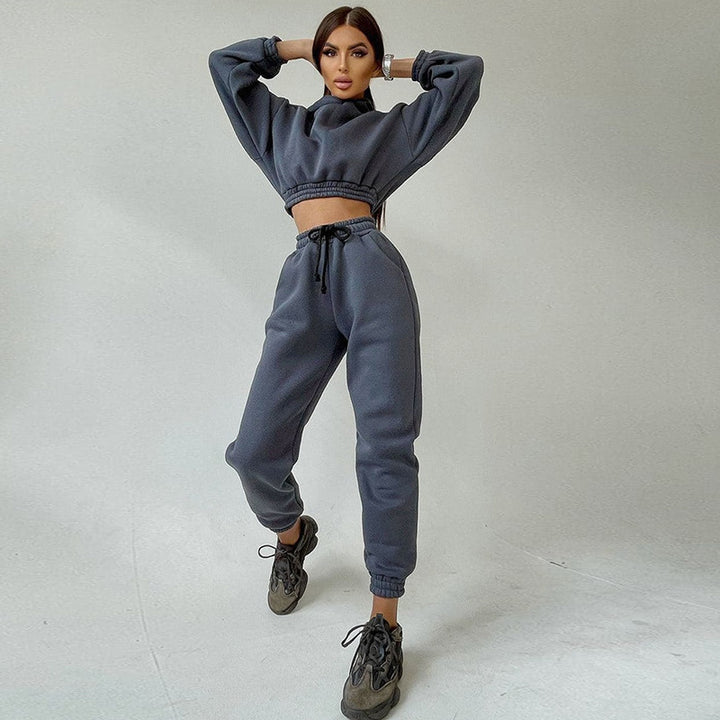 Kvinders sporty cropped sweat sæt med elastisk talje og praktiske lommer