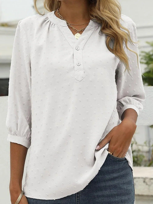 Damebluse med fin struktur og knapliste Stilla