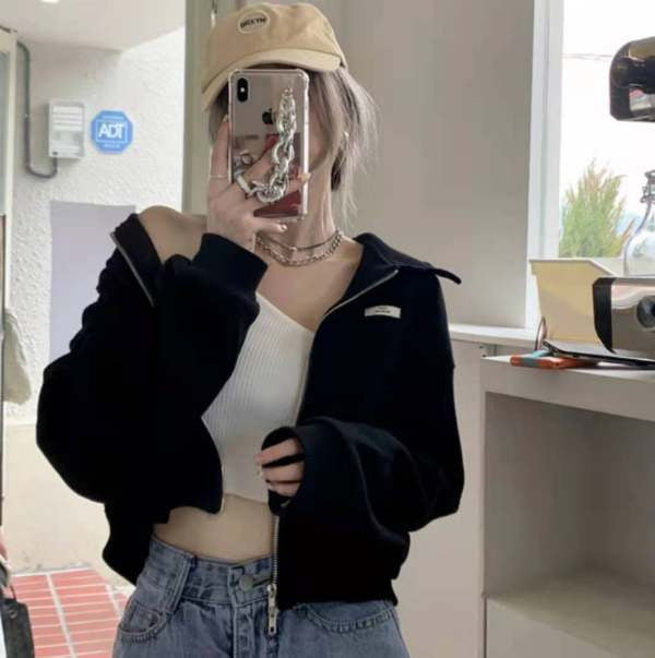 Dame cropped fleece jakke med moderne lynlås og afslappede ærmer