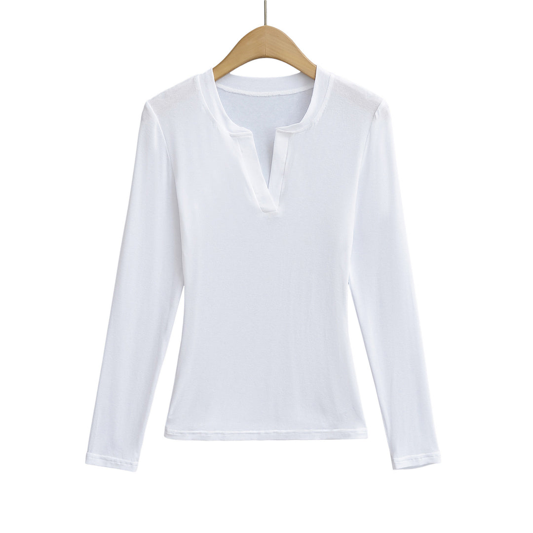 Damer longsleeve top med moderne V-halsudskæring og fin struktur Stilla