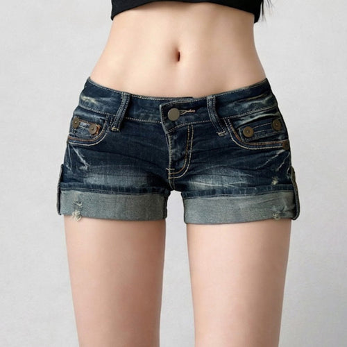 Dame casual denim shorts med fashionable distressed detaljer og ombukket kant Skovae