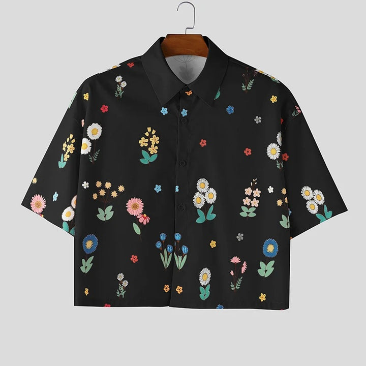 Damer nan kastig skåret kortærmet skjorte med blomstret allover-print, skjortekrave og kort søm Skovae