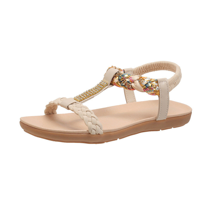 Dame sandaler i fashionable flet-design med elegante smykkedetaljer Stilla