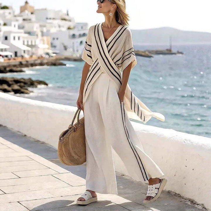 Dame nan resort-inspireret sæt med krydset kimono-tunika og højt skåret palazzo-bukser Skovae