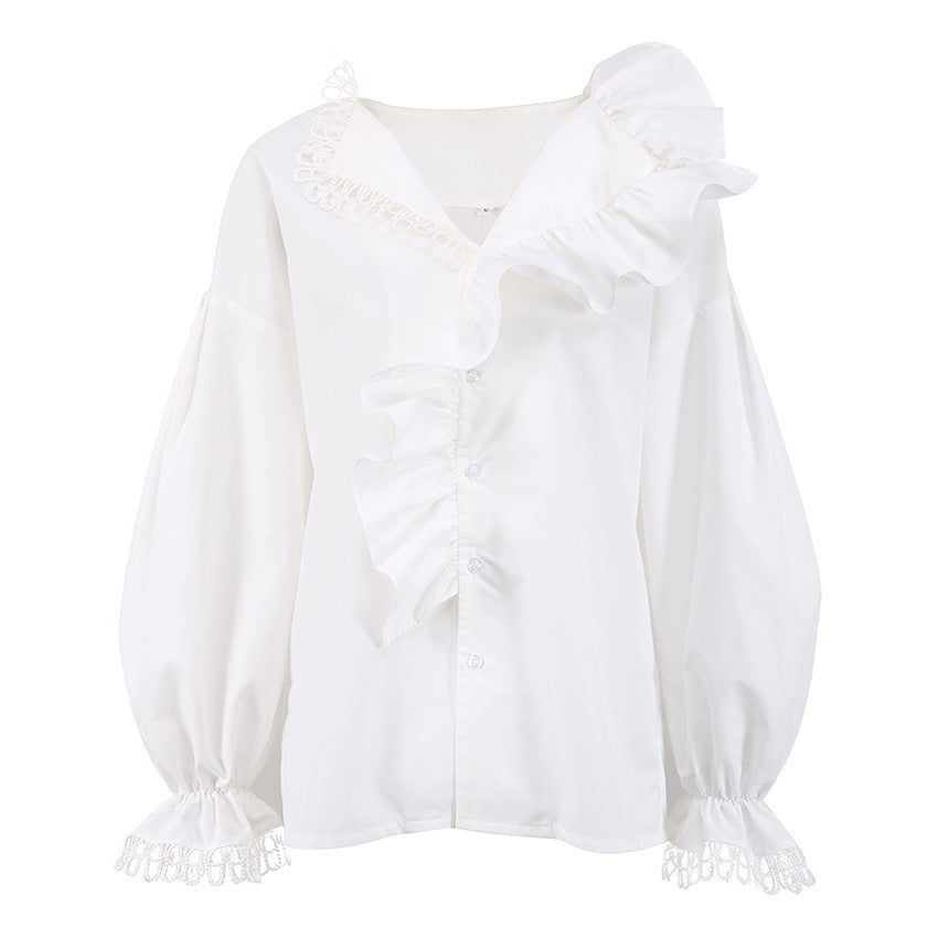 Damebluse med voluminøse flæsedetaljer og elegante ærmer Stilla