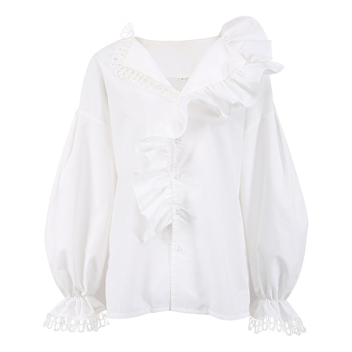 Damebluse med voluminøse flæsedetaljer og elegante ærmer Stilla