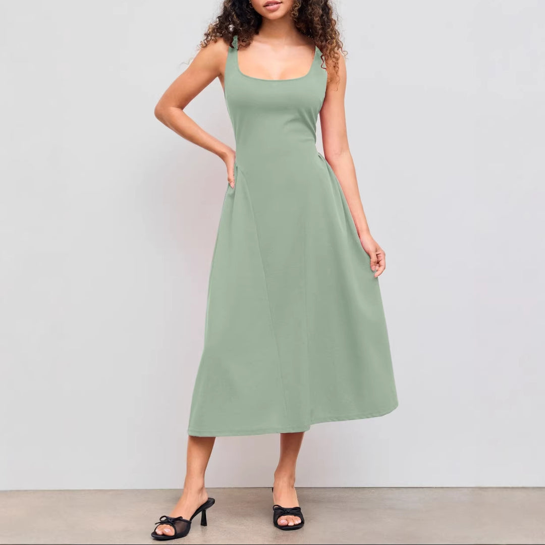 Dame maxikjole med off-shoulder design og figurvenlig pasform Skovae