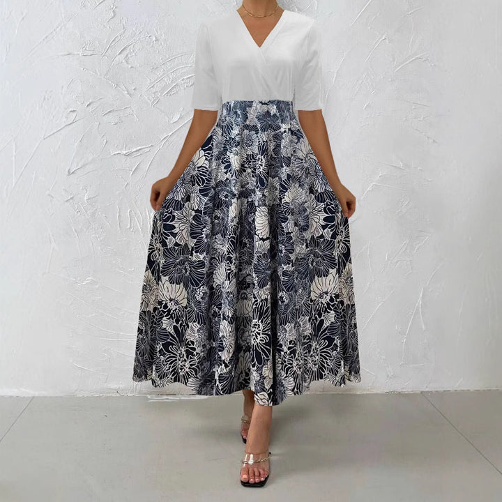 Dame Maxikjole med blomstret design og elegant indpakningseffekt Stilla