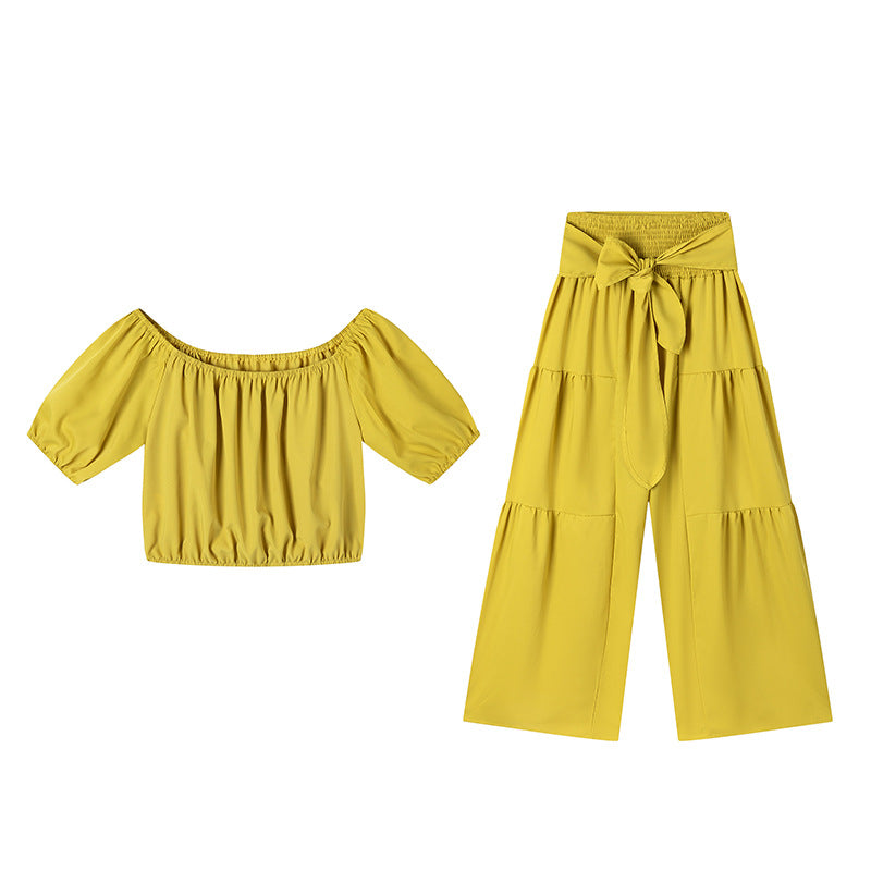 Dame stilfuld off-shoulder crop top og bred bukser sæt Stilla
